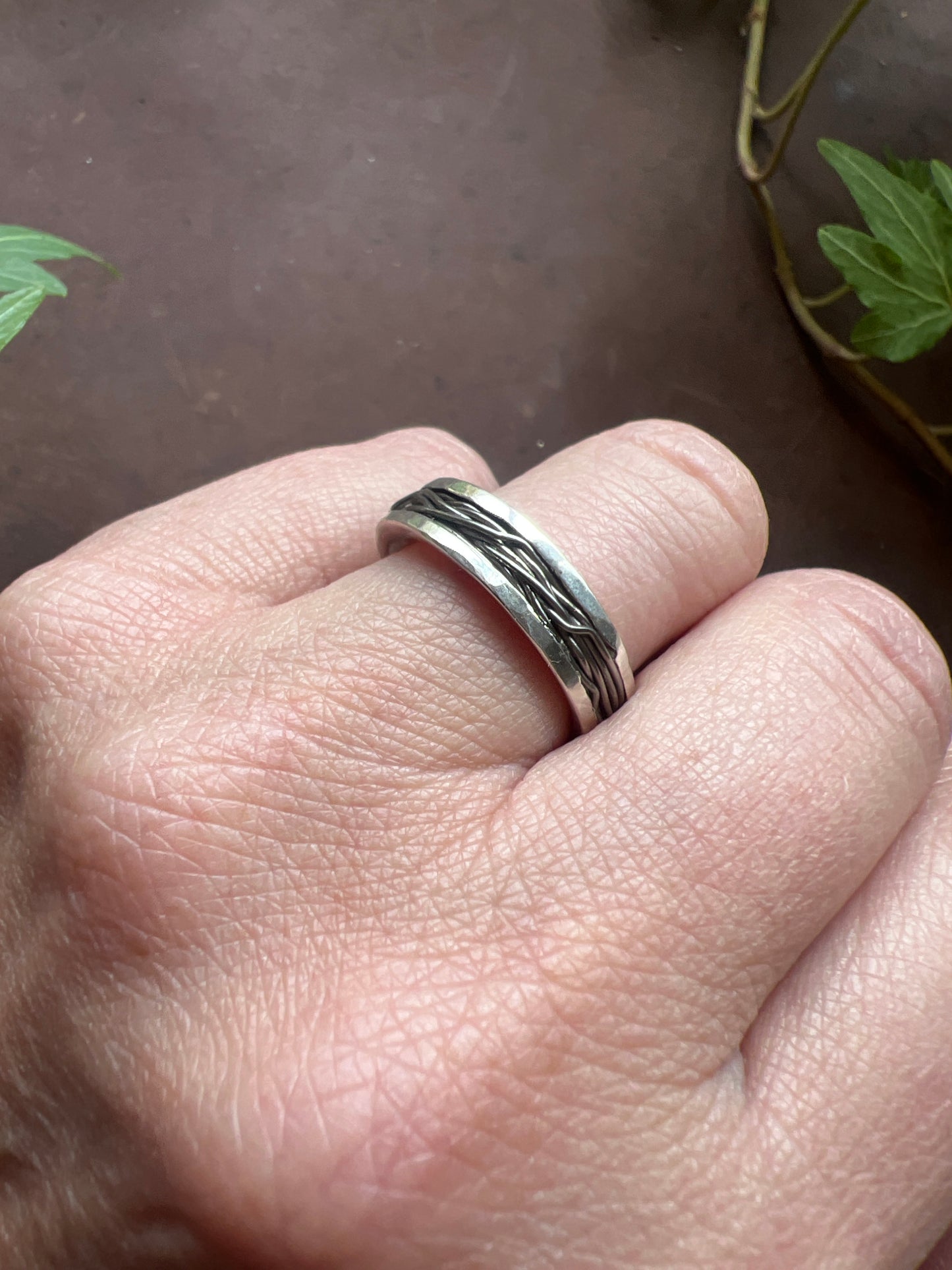 Ring in recycled silver with a titanium wire stripe