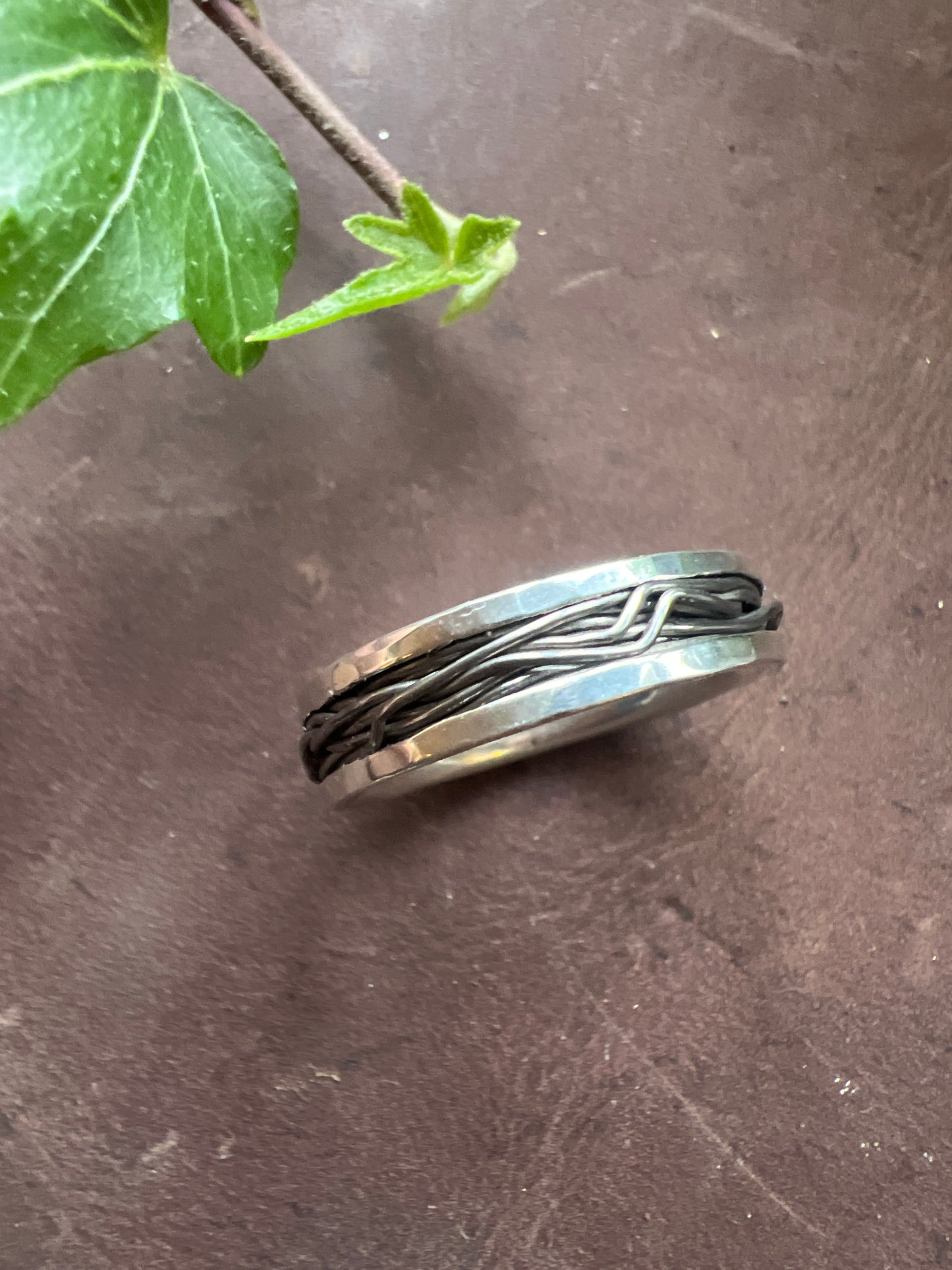 Ring in recycled silver with a titanium wire stripe